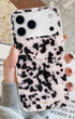 Stylish pink tortoise iPhone case with glossy finish
