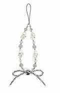 Crystal pearl bow phone charm with elegant detailing