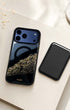 Classic black phone wallet with black glitter iPhone case, flat lay