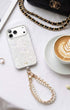 Beaded phone charm with white leather accents