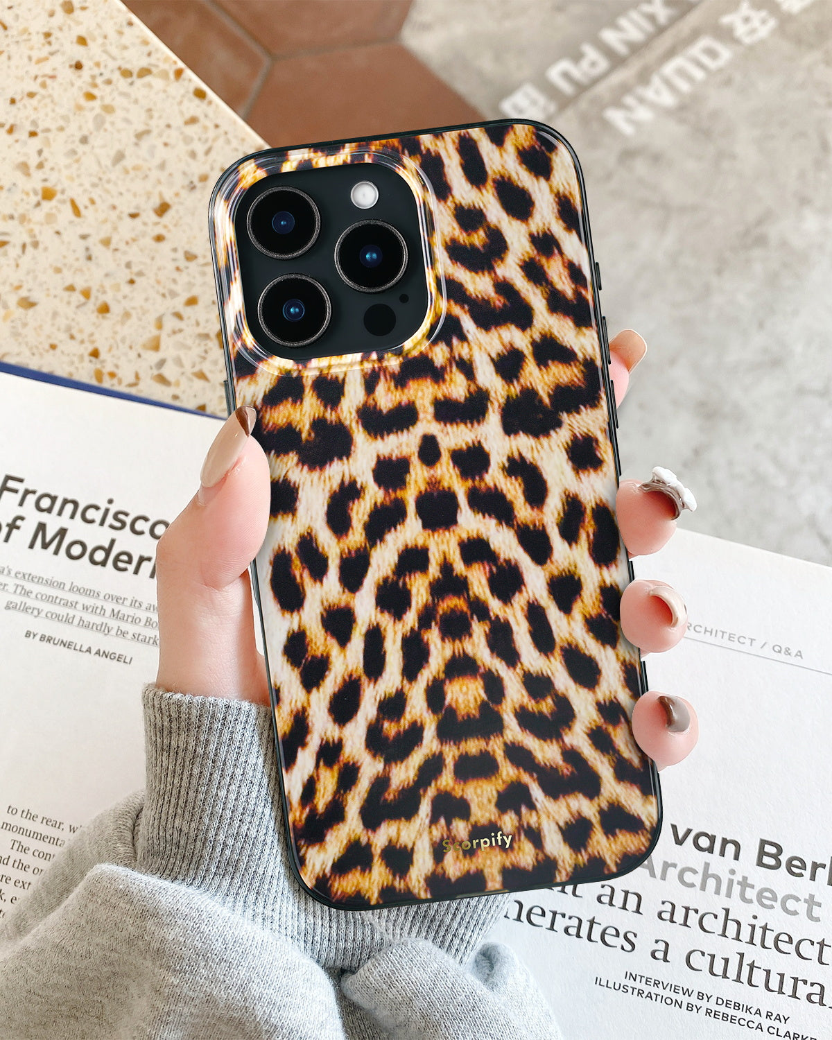 Magnetic iPhone case featuring bold leopard artwork