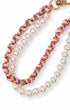 Stylish beaded phone charm in soft pink tones