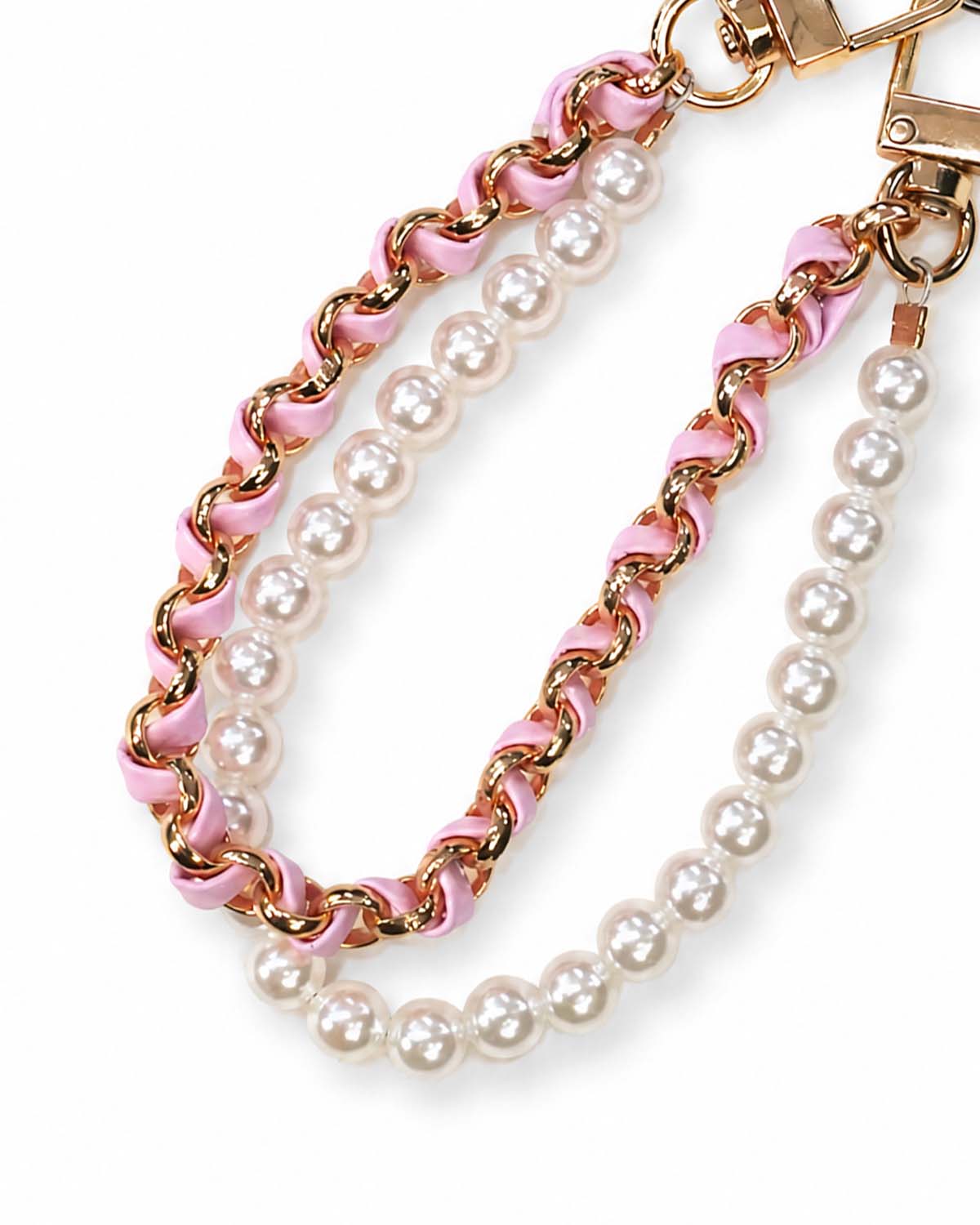 Stylish beaded phone charm in soft pink tones