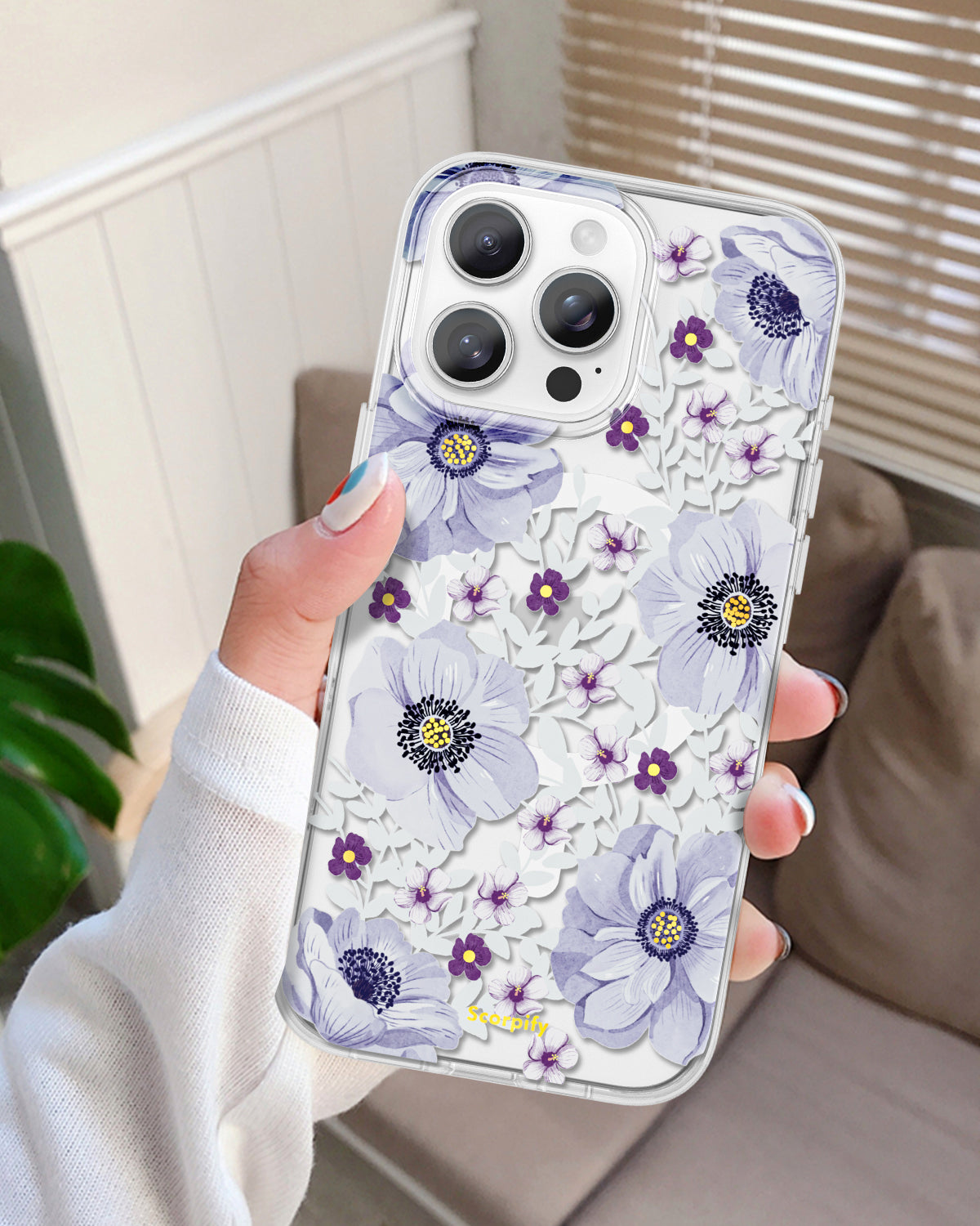 Clear MagSafe iPhone case with purple anemone florals