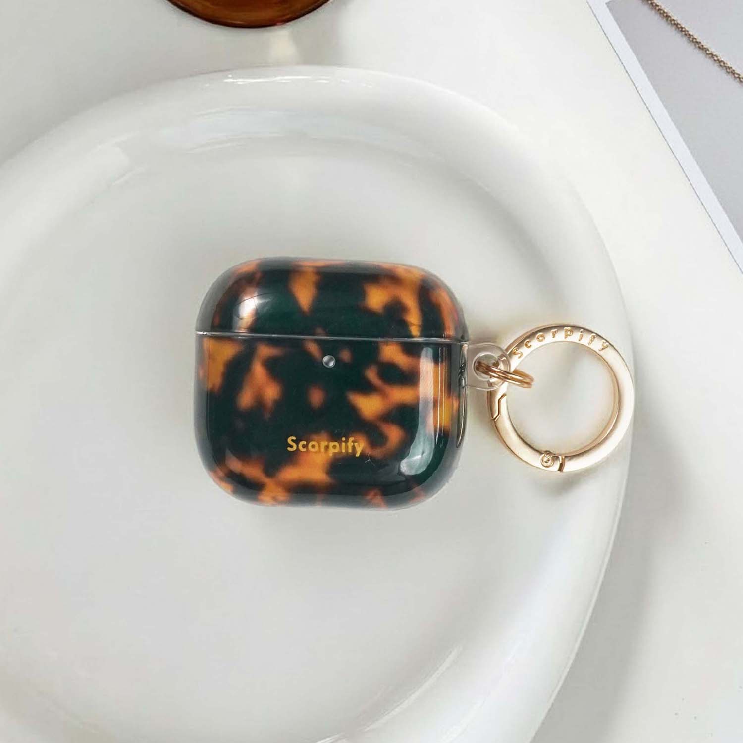 Tortoise shell airpod case cover in deep brown tones
