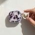 Tortoise shell airpod case cover in soft pink tones
