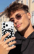 Black cheetah print iPhone 17 case with transparent finish