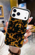 Stylish tortoise iPhone case with glossy brown design