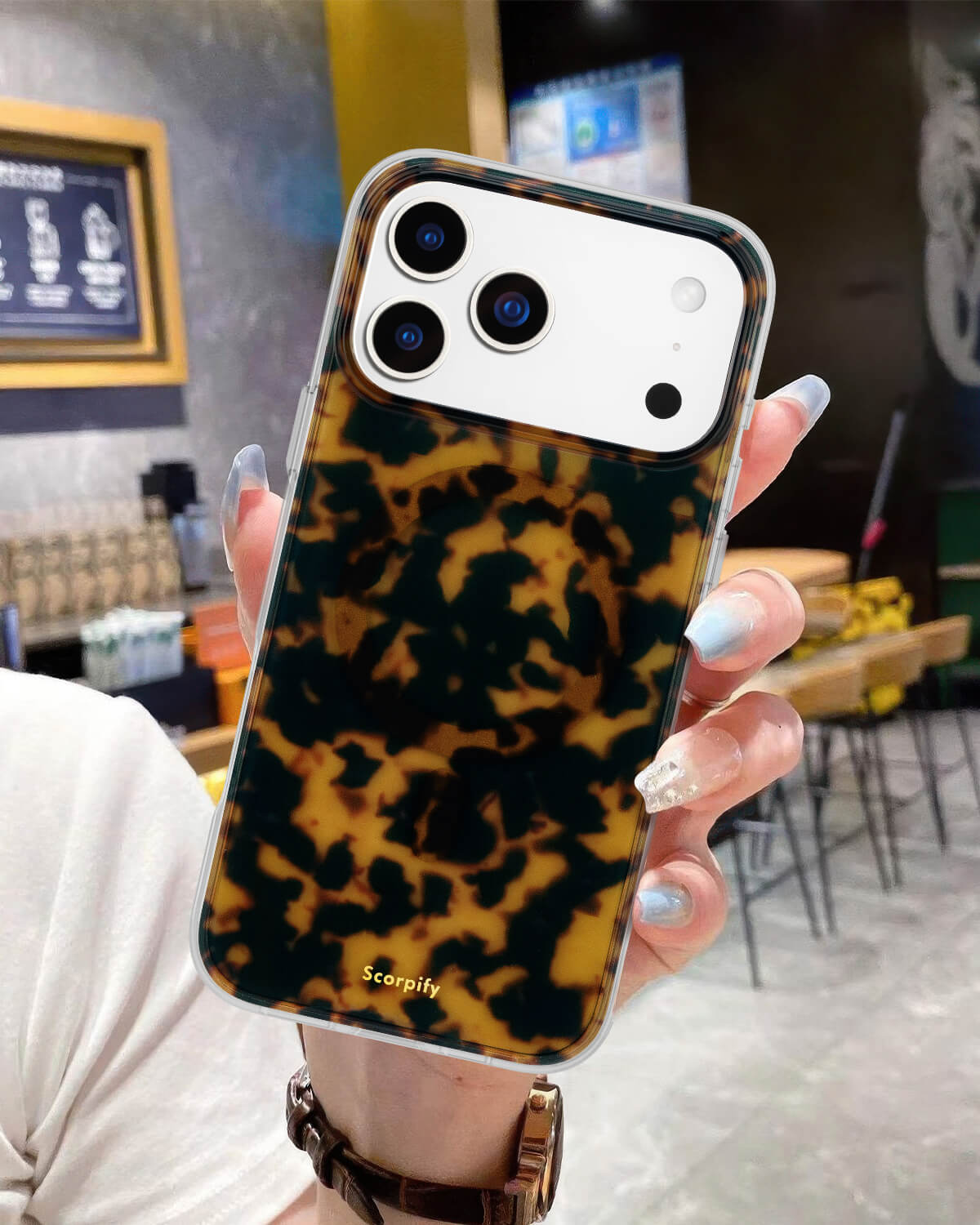 Stylish tortoise iPhone case with glossy brown design