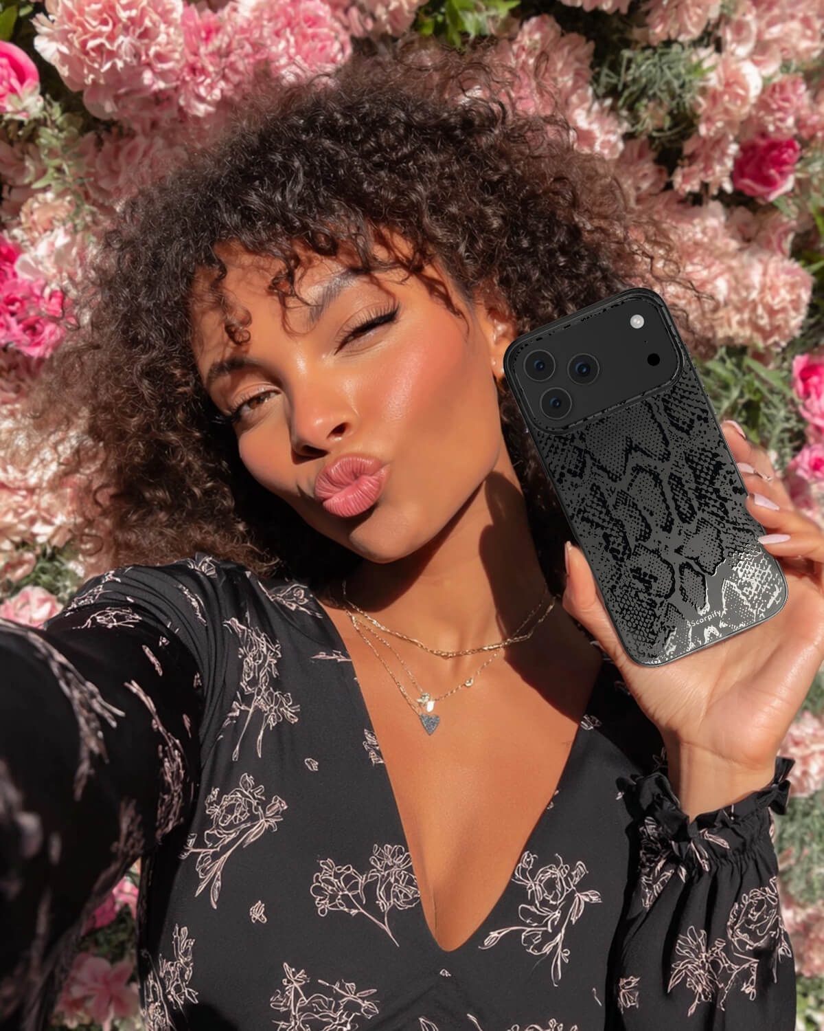 Elegant matte black snake phone cover for iPhone 17