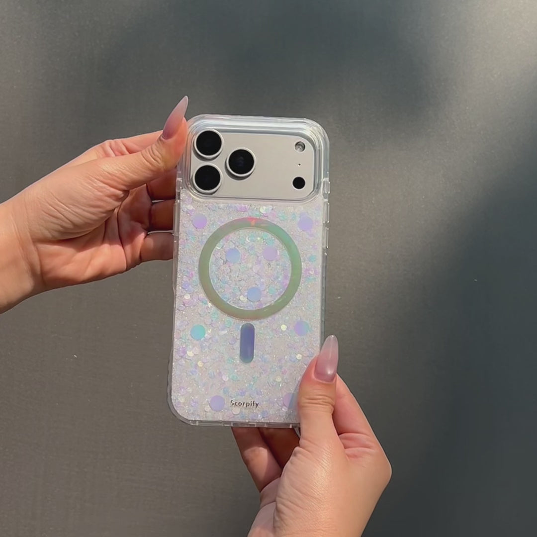 Hand holding glitter phone case with rainbow ring